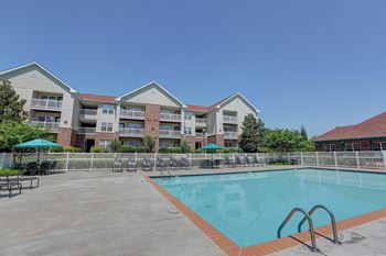 Sparkling swimming pool and spacious sundeck at Autumn Winds in Clarksville, TN